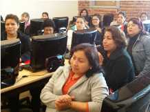 A group of women at a computer training