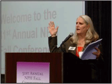 Non Profit Housing Association executive director Diane Spaulding presents