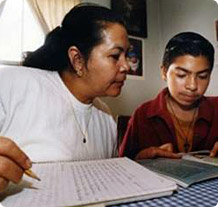 Mother and son doing homework